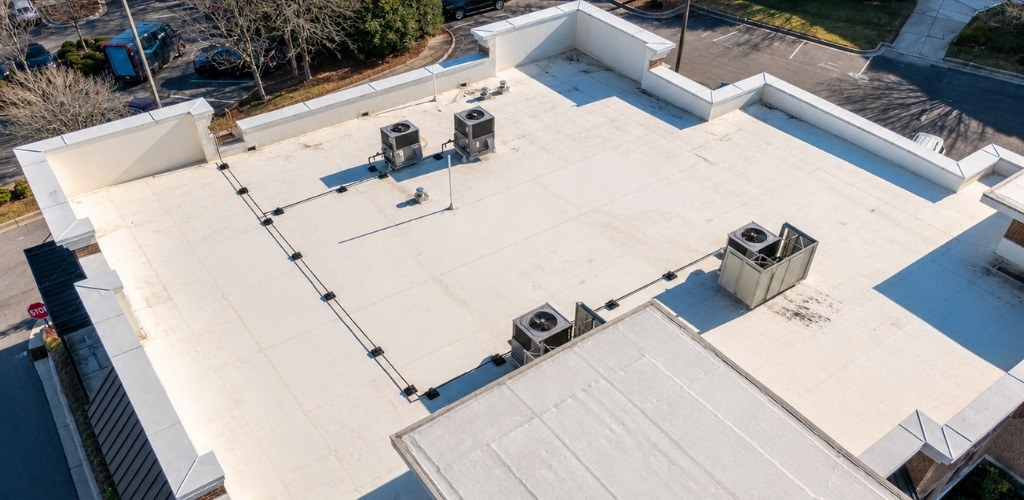 commercial flat roof with a white reflective membrane